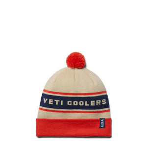Pom Beanie balta / oranžinė YETI